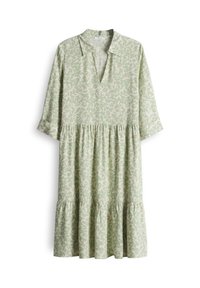 Robe vert clair en tissu doux avec un décolleté en V, des manches longues et un ourlet à volants présentant un motif abstrait blanc.