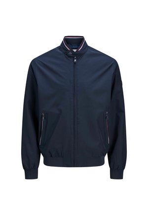 Veste bomber bleu marine en tissu léger, avec un col montant, une fermeture éclair à l'avant et deux poches latérales avec des fermetures éclair contrastantes.