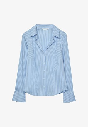 Svetlo modrá košeľa s dlhým rukávom na gombíky s tenkými bielymi pruhmi, golierom a manžetami. Má voľný strih a dve bočné vrecká.