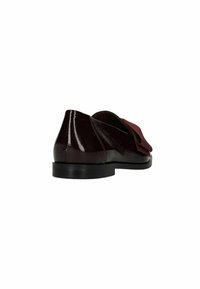 Glossy dark burgundy flat shoe with a wide fabric bow on top and a low black heel, viewed from the back and side.