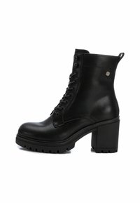 XTI Botines con plataforma - black