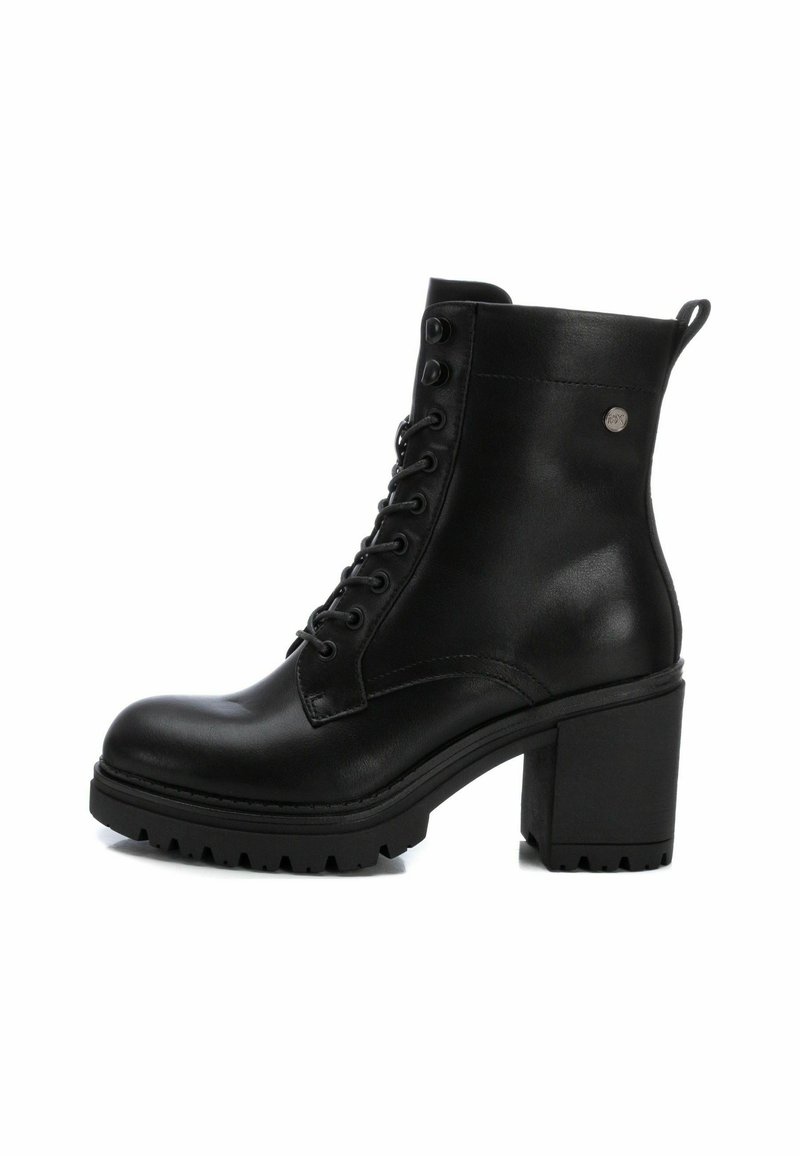 XTI Botines con plataforma - black