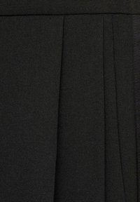 Mango SMOCK - Nohavice - black