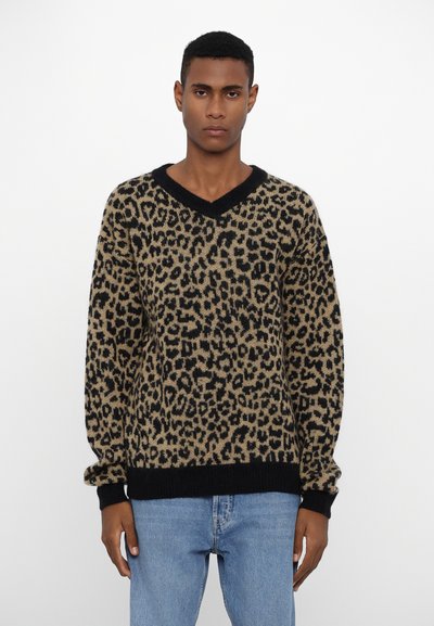 Leopard-print knitted sweater in beige and black. V-neck design with ribbed cuffs and hem. Soft texture, relaxed fit.