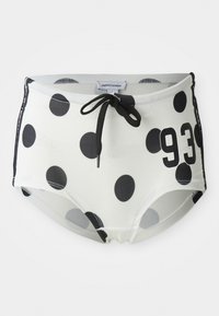 Black and white polka dot swim shorts with a drawstring waistband, featuring the number "93" on the front and a smooth, stretchy fabric.