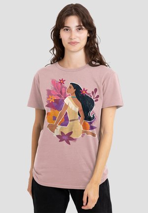 Pink cotton t-shirt featuring an illustration of a woman with long black hair, surrounded by colorful floral designs. Short sleeves, round neck.