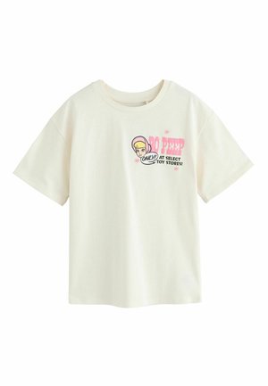 Cremefarvet T-shirt med korte ærmer med tegneserie pige og lyserød tekst med "PO PEEP ONLY! AT SELECT TOY STORES!" på brystet.