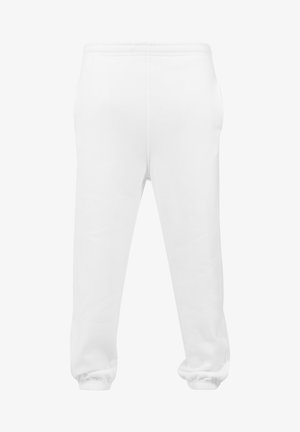 Hvide sweatpants lavet af blødt stof, med en elastisk talje, side lommer og elastiske manchetter ved anklerne.