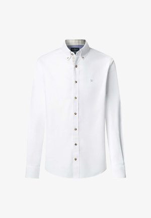 Witte blouse met lange mouwen en knoopsluiting, met een geknoopte kraag, bruine knopen, een subtiel borstlogo en een geblokte voering aan de binnenkant van de kraag.