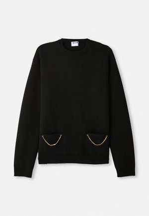 Black long-sleeve sweater with crew neck featuring two front pockets each adorned with a small gold chain detail.