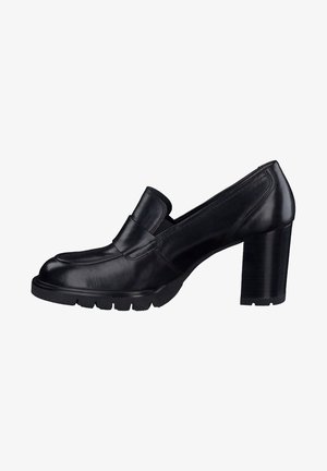 Mocassins de salto alto em couro preto, com fixadores elásticos laterais, bico arredondado, sola texturizada e um salto robusto.