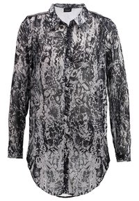 Blouse transparente à manches longues à motifs noirs et blancs avec col et boutons, conçue par VILA.