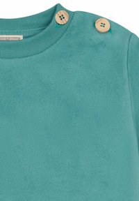 Turquoise fleece shirt met een ronde hals en twee houten knopen op de schouder. Zachte textuur met een soepele afwerking.