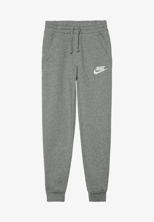 Nike grijze joggingbroek gemaakt van zachte stof met een elastische tailleband, trekkoord, zijzakken en een wit logo op de linker bovenbeen.