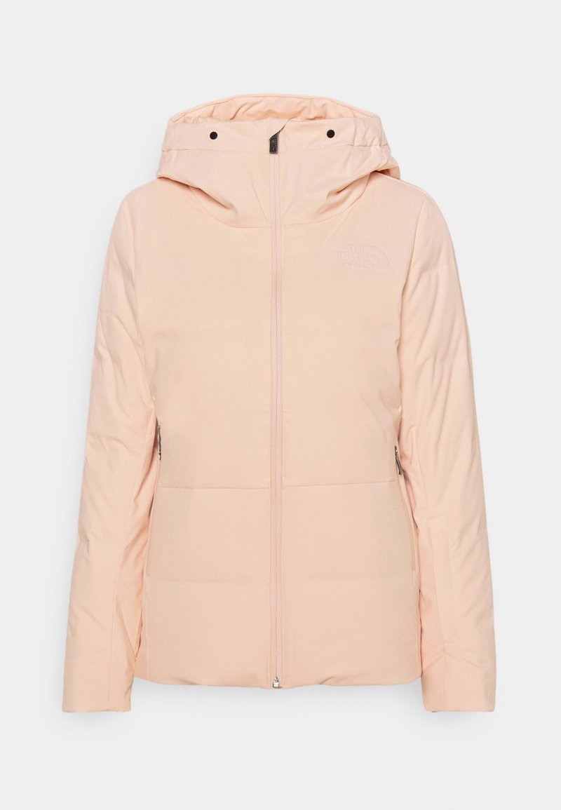 Veste à capuche rose clair avec fermeture éclair à l'avant et poches latérales zippées, conçue pour temps froid.