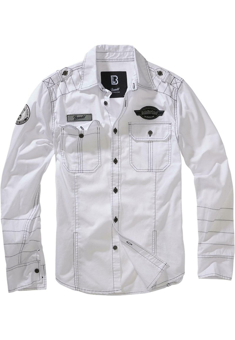 White long-sleeve shirt with black stitching, two chest pockets, and a patch on one sleeve. Features button-up front and collar.