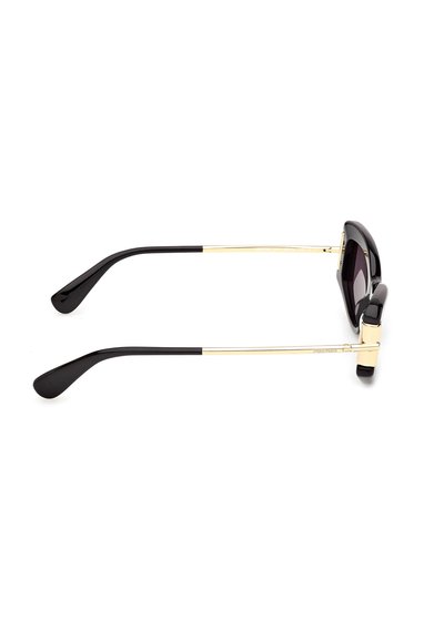 Black and gold sunglasses with rectangular dark lenses, thin gold metal arms, and black plastic curved temple tips, shown from the side.