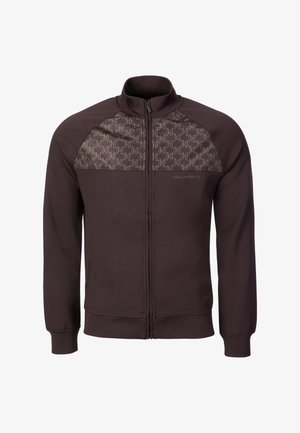 Mørkebrun jakke med lynlås, høj krave, mønstrede brystpaneler og ribbede manchetter og kant.