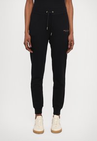 Armani Exchange TROUSER - Donji dijelovi trenirke - black/gold