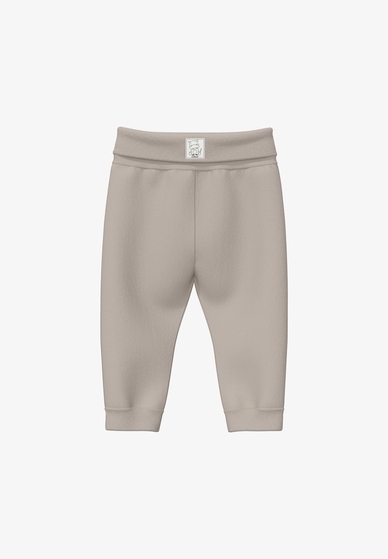 Pantalon bébé beige doux avec taille élastique et poignets, arborant un petit logo d'ours en peluche sur le devant au centre de la taille.