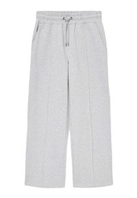 Hellgraue Jogginghosen aus weichem Material, mit elastischem Bund, Kordelzug, zwei seitlichen Taschen und geradem Bein.