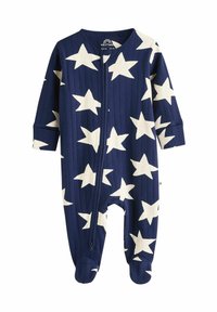 Combinaison en coton bleu marine avec un motif d'étoiles blanches, texture côtelée, manches longues et fermeture à glissière à l'avant. Conception avec pieds pour le confort et la chaleur.