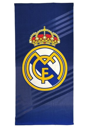 Ciemnoniebieska tkanina z dużym, żółto-białym logo klubu piłkarskiego Real Madryt na środku, u góry zwieńczona czerwoną i złotą koroną.