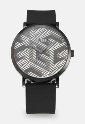 Orologio nero con quadrante grigio a motivo geometrico, dotato di rifiniture argentate, cassa rotonda e cinturino in silicone nero opaco.