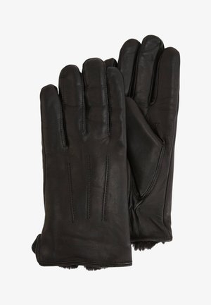 Paire de gants en cuir noir avec trois lignes de couture décoratives au dos et une doublure douce visible au niveau des poignets.