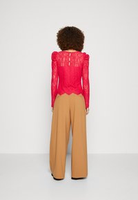 Morgan TYRO - T-shirt à manches longues - fuchsia