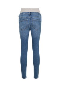 Μπλε τζιν παντελόνι με γκρι μέση, εφαρμοστή σχεδίαση και δύο πίσω τσέπες, με λεία υφή και ελάχιστες λεπτομέρειες ραφών.