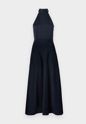 Mornarica halter-model haljina s uskim korzetom i lepršavom suknjom. Izrađena od glatke tkanine, s nabranom teksturom i detaljem na ramenima.