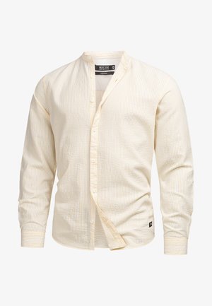 Light yellow shirt with a textured fabric and subtle horizontal stripes. Features a band collar, long sleeves, and button front.