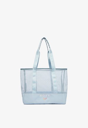Jasnoniebieska siatkowa torba typu tote z logo "Roxy" na spodzie, z szerokimi uchwytami z powtarzającym się brandingiem "Roxy".