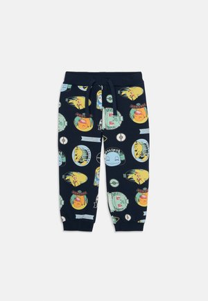 Pantalons de jogging bleu marine en coton, ornés de personnages Pokémon ludiques dans des couleurs variées et des accents ronds, avec une taille élastique et un cordon de serrage.