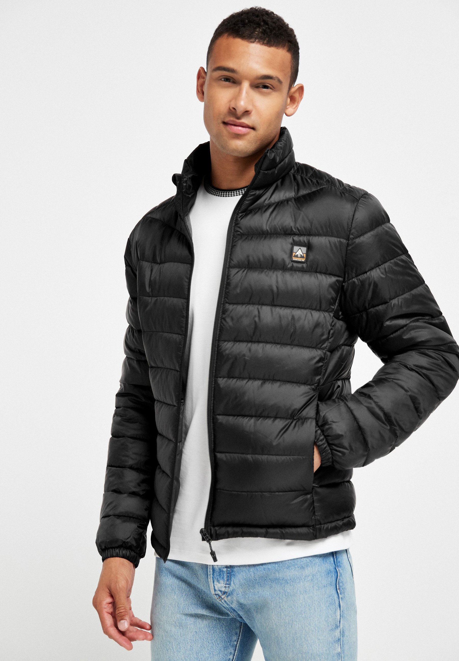 next black puffer coat