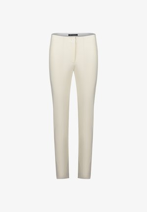 Pantalons sur mesure de couleur crème, à coupe slim, avec fermeture à bouton sur le devant et détails de couture sur les côtés. Fabriqués en tissu extensible.