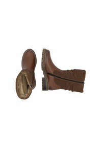 Stivaletti in pelle marrone con una morbida fodera in pelliccia sintetica, dettagli in suede e una cerniera laterale. Presentano una suola spessa e robusta per una buona trazione.