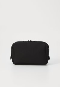 Black rectangular pouch made of soft fabric with a zip closure and rounded corners. No visible patterns or hardware details.