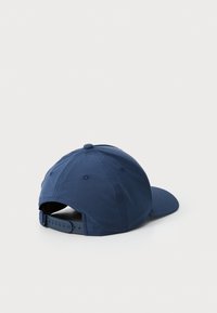 Navy blue baseball cap made of fabric, featuring a curved brim, six-panel design, and an adjustable plastic strap at the back.