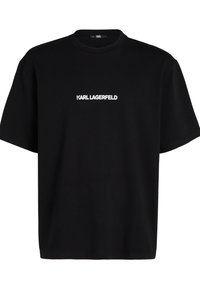 Svart bomulls t-shirt med rund hals och korta ärmar. Har en vit "KARL LAGERFELD" logotyp tryckt över framsidan.