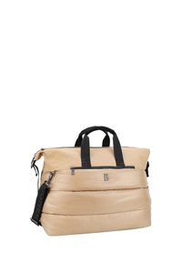 Borsa puffa beige con accenti neri, doppio manico superiore, tracolla regolabile, tasca frontale con zip e texture trapuntata.