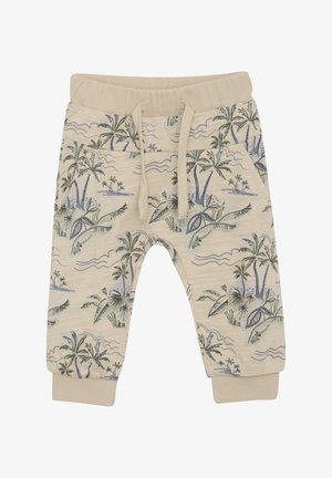 Cream colored jogger pants with palm tree and ocean wave print, elastic waistband with drawstring, and ribbed cuffs. Soft cotton material.