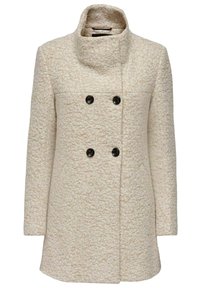 Double-breasted coat in cream textured fabric with a high collar, featuring two black buttons and side pockets. Accentuated stitching detail.