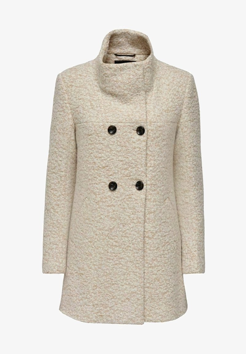 Double-breasted coat in cream textured fabric with a high collar, featuring two black buttons and side pockets. Accentuated stitching detail.