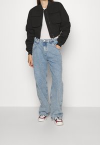 Tommy Jeans Džíny Relaxed Fit - light-blue denim