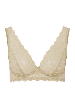 Kant beha in lichtbeige met een golvende halslijn en afwerking, zachte cups en bloemenpatroon. Verstelbare bandjes.