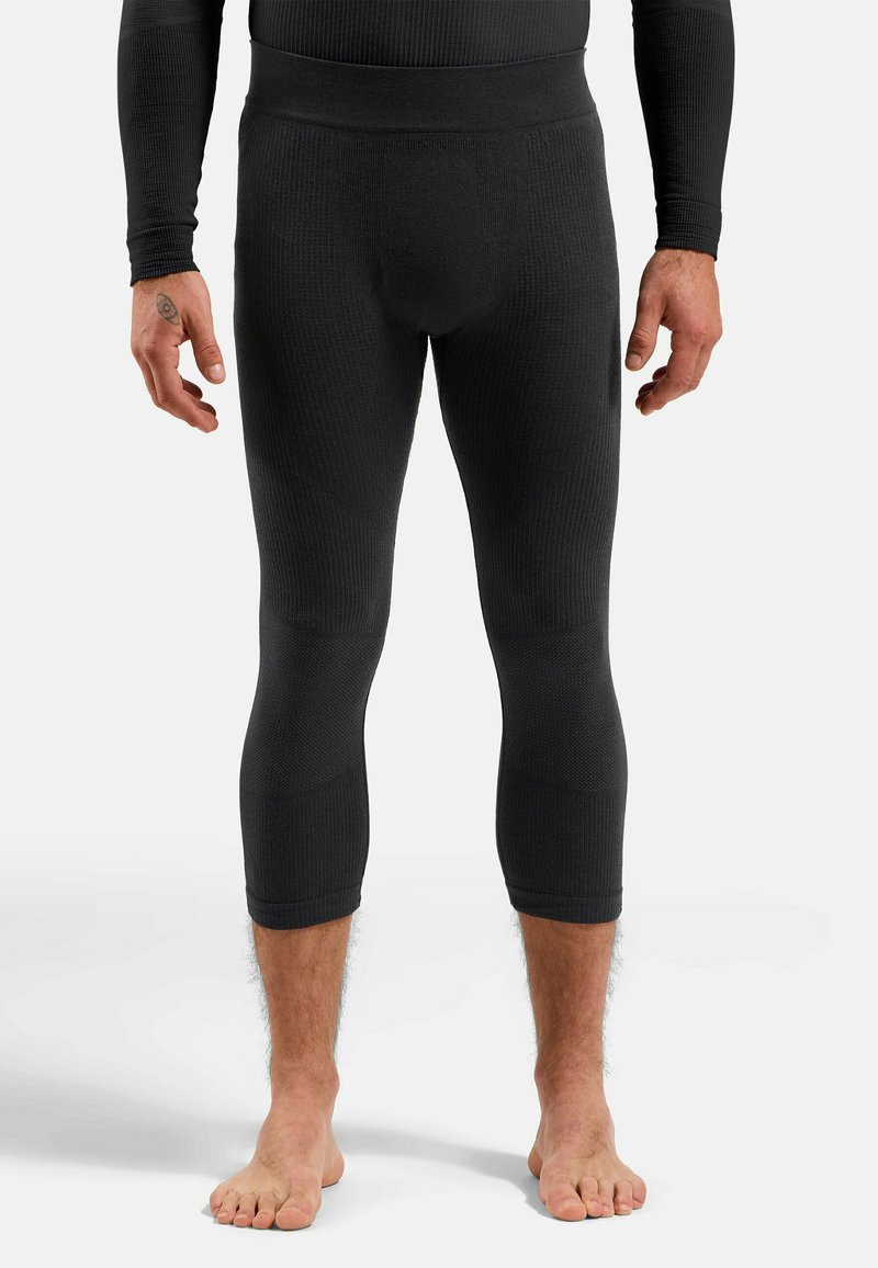 Schwarze Rippleggins mit einer enganliegenden Passform, ausgestattet mit einem hohen Bund und kürzerer Länge, aus dehnbarem, strukturiertem Stoff.