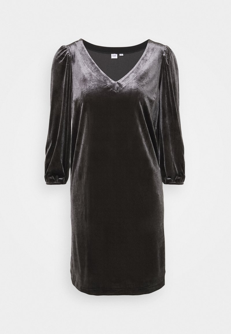 Svart sammetklänning med V-ringning, puffärmar och rak silhuett. Mjuk textur med subtil glans.