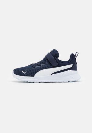 Navy blue athletic shoes with a textured mesh upper, white accents, a Velcro strap, and a cushioned sole designed for comfort and support.